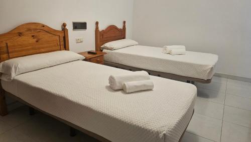 Postel nebo postele na pokoji v ubytování Hotel Nuevo Julios by Olda
