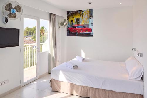 Cama ou camas em um quarto em Hostal Floridita Adults Only