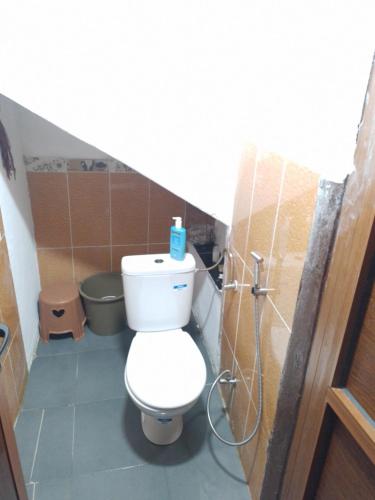 a small bathroom with a toilet in a stall at Apartment in Safi Top Near the Sea, Morocco in Safi