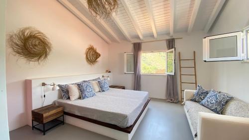 Postel nebo postele na pokoji v ubytování Malhada do Sao