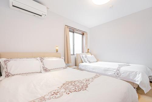 Llit o llits en una habitació de W Hostel