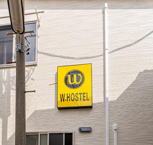 Sertifikat, nagrada, logo ili drugi dokument prikazan u objektu W Hostel
