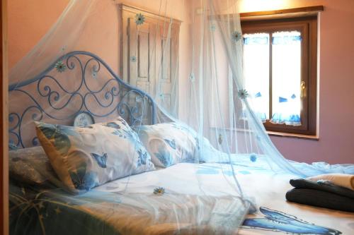 Una cama o camas en una habitación de Il paradiso delle beccacce