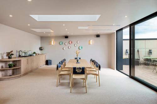 a conference room with a table and chairs at ARK Wembley in London