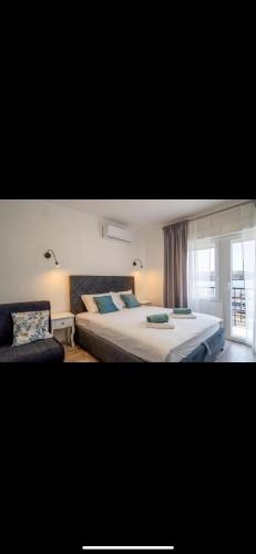 Postel nebo postele na pokoji v ubytování Apartman Jan