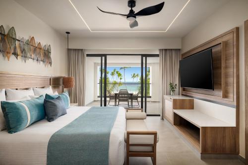 Ένα ή περισσότερα κρεβάτια σε δωμάτιο στο Secrets Tides Punta Cana - All Inclusive