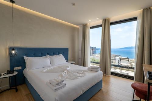 Postel nebo postele na pokoji v ubytování Art Hotel