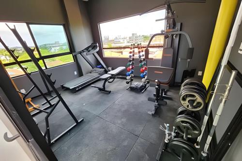 an overhead view of a gym with tread machines at Flat pé na areia na praia de Porto de Galinhas próximo as piscinas naturais. in Porto De Galinhas
