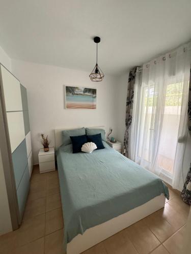 Postel nebo postele na pokoji v ubytování Siviri Holiday Home