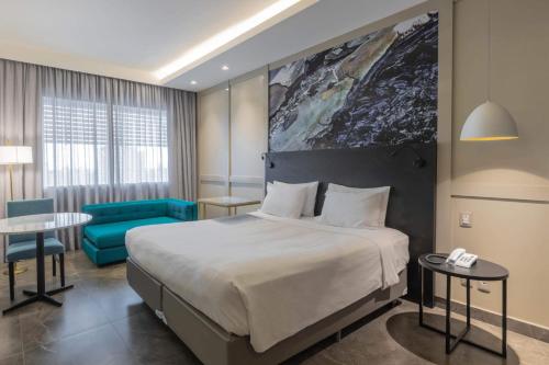 Postel nebo postele na pokoji v ubytování Hotel Deville Prime Cuiabá