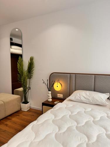 Ένα ή περισσότερα κρεβάτια σε δωμάτιο στο Agate Luxury 2B