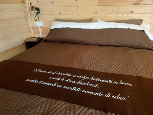 A bed or beds in a room at Choco B&B