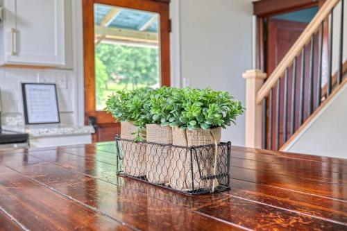 a potted plant sitting on top of a wooden table at The Farm House in Dillsburg