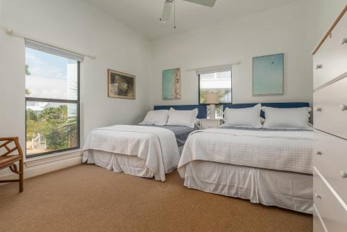 En eller flere senge i et værelse på New Listing Spotlight! Pink Palace