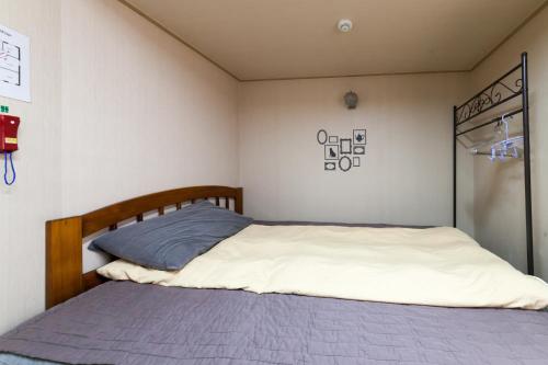 Postel nebo postele na pokoji v ubytování Yehadoye Guesthouse