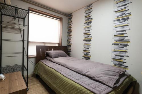 Postel nebo postele na pokoji v ubytování Yehadoye Guesthouse