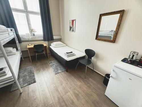 Ένα ή περισσότερα κρεβάτια σε δωμάτιο στο Hostel Hermanni