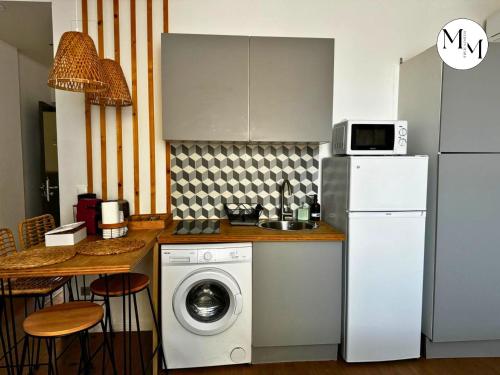 Кухня или мини-кухня в Studio Déco Blancarde 2-3 pers Terrasse Parking Clim

