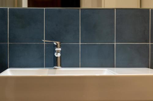 Ένα μπάνιο στο Oldoini Luxury Apartment and Suites