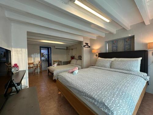 Postel nebo postele na pokoji v ubytování Lamma Bali