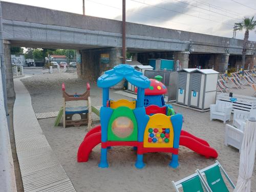 a childs play equipment in a playground at Residence Aurora Wellness & Spa in Albenga
