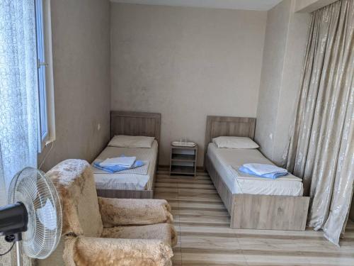 Letto o letti in una camera di Tsisa House