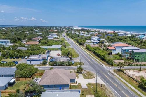 an aerial view of a town with a road and the ocean at Charming and delightful getaway! Walk to Beach in Saint Augustine