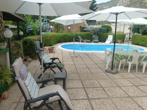 Πισίνα στο ή κοντά στο Villa Aurora Appartamento in villa con piscina