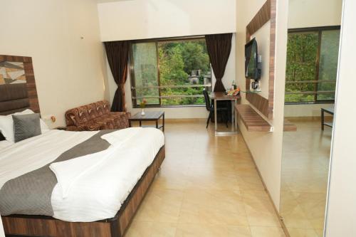 Hotel Lalit innにあるベッド