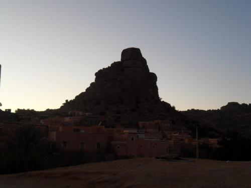 a view of a mountain with a town in the foreground at Maison d'hôtes afoulki tafraout in Tafraoute