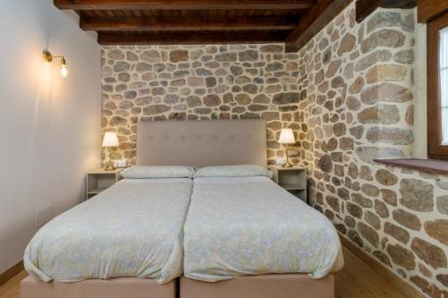 Ένα ή περισσότερα κρεβάτια σε δωμάτιο στο La Casona de Vernejo