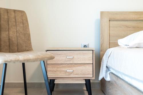 Ένα ή περισσότερα κρεβάτια σε δωμάτιο στο Blue Waters Suite Kos Centre