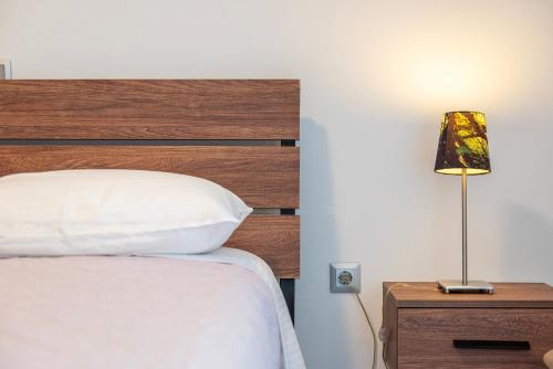 Ένα ή περισσότερα κρεβάτια σε δωμάτιο στο Blue Waters Suite Kos Centre
