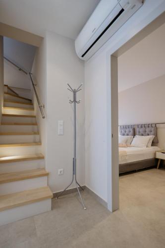 Katil atau katil-katil dalam bilik di Serenity Suites by Corfu Collection