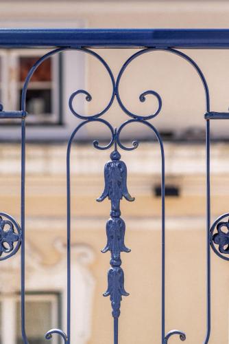 a close up of a forged iron gate at Boutique Chiado Suites in Lisbon