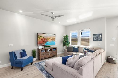 a living room with a couch and two chairs at Ocotillo Springs Resort 45 l Brand New Property, Private Pool, Hot Tub, & Community Pool in Santa Clara