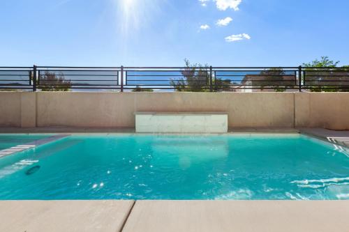 a swimming pool on top of a building at Ocotillo Springs Resort 45 l Brand New Property, Private Pool, Hot Tub, & Community Pool in Santa Clara