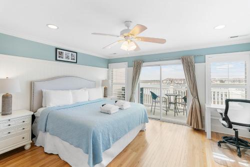 a bedroom with a bed and a ceiling fan at 16 Turtle Bay Riverview Pool in Folly Beach