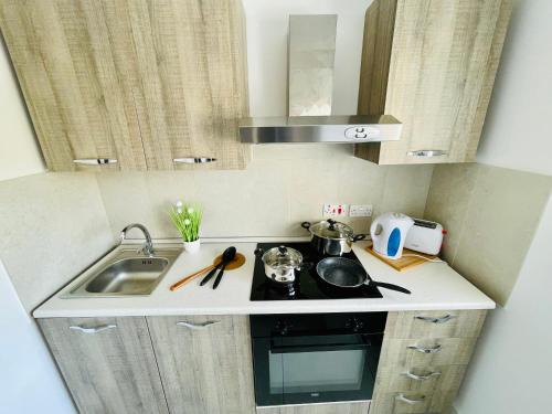Η κουζίνα ή μικρή κουζίνα στο Birgu 2BR comfort Apartment by Holi