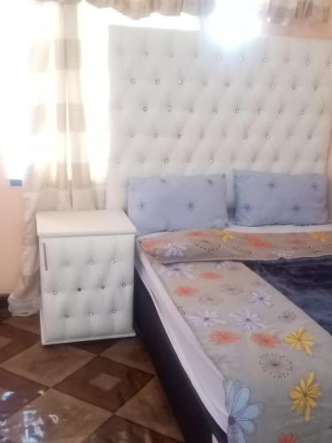Postel nebo postele na pokoji v ubytování Pearl inn guest house vereeniging