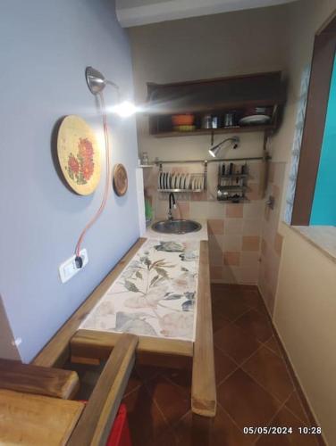 Una cocina o zona de cocina en L'Amica di Napoleone Elba island