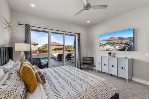 a bedroom with a bed and a large window at Ocotillo Springs 67 Low Prices, Private Hot Tub, Pool, Basketball Arcade, Ping Pong and Community Pool in Santa Clara