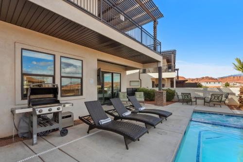 a house with a pool and a grill and chairs at Ocotillo Springs 67 Low Prices, Private Hot Tub, Pool, Basketball Arcade, Ping Pong and Community Pool in Santa Clara