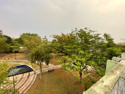 an overhead view of a garden with a tent and trees at Samruddhi S3 homestay garden villa or S1 in Nagpur