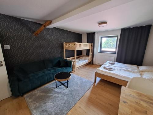 Postel nebo postele na pokoji v ubytování Apartmány Javorná
