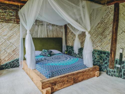 Katil atau katil-katil dalam bilik di EntreAguas Ecolodge