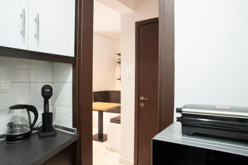 Dimo's Apartmentにあるキッチンまたは簡易キッチン