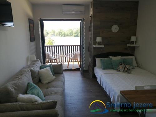 Postel nebo postele na pokoji v ubytování Ferias Apartmani