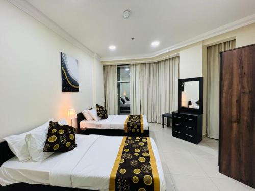 Postel nebo postele na pokoji v ubytování Chelsea Gardens Apartment