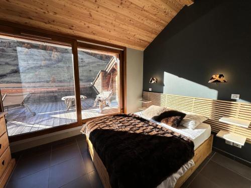 Postel nebo postele na pokoji v ubytování Résidence Les Terrasses De Vars Ste Marie - LES TERRASSES DE VARS SAINTE MARIE MAE-9941